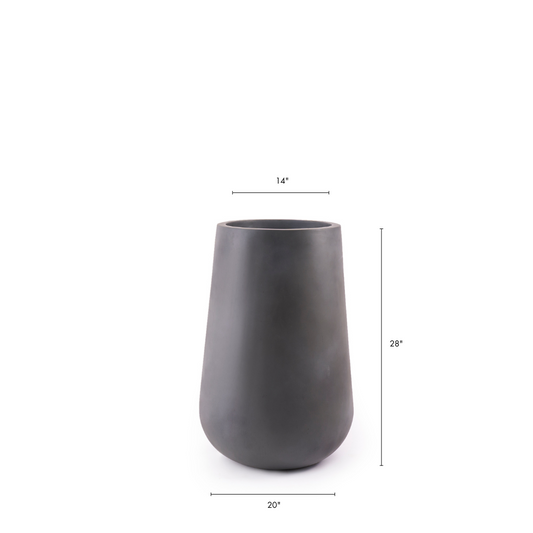 The Rony FRP Grey large planter by Studio Palasa is an ideal fit for living rooms, balcony's and gardens. This large planter has been designed to be tall and sleek with a grey concrete finish, making it the perfect addition to your space. Buy large planter pots online India.