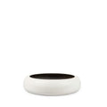 Collider Pond FRP White Planter is a perfect choice for growing water lilies or creating a stunning succulent garden. Place it indoors or outdoors - its lightweight and durable design ensures that it stands the test of time. The round shape and unique design make it a great accent piece to any flower bed.